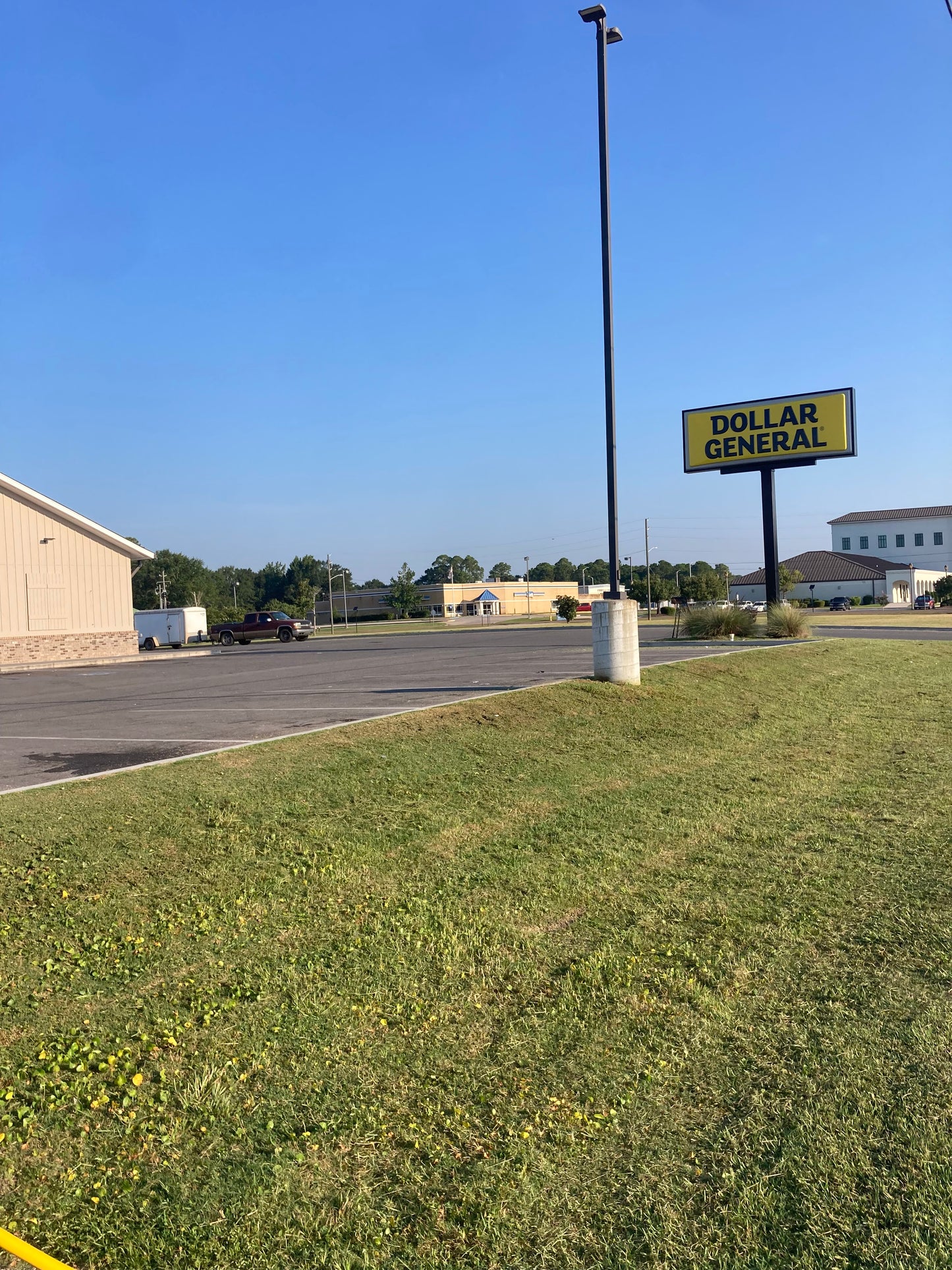 commercial lawn care of retail store cut in Mississippi